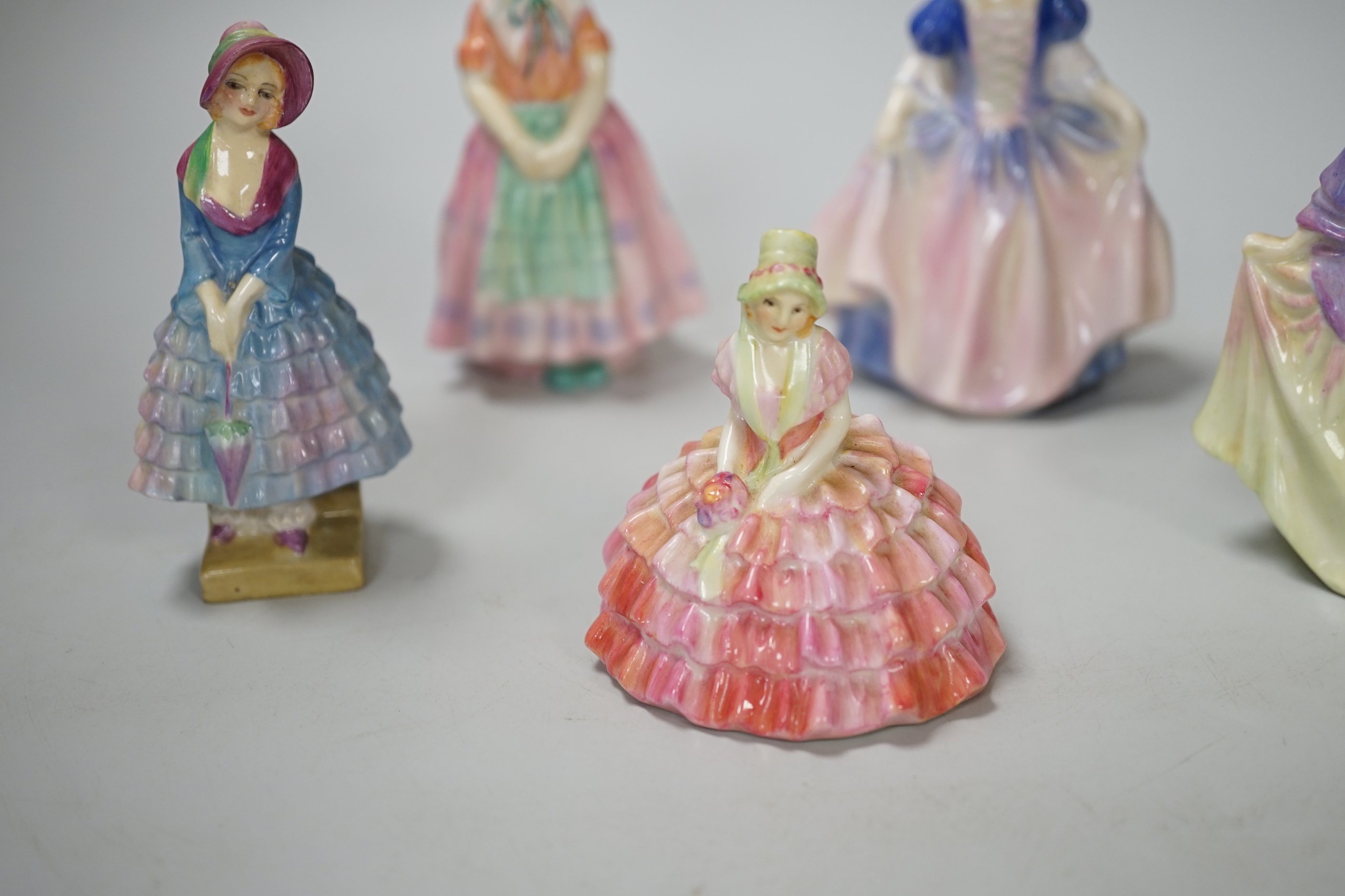 Five royal Doulton figurines, three figures pre HN numbers: Priscilla M5, Chloe M9, Sweet Anne M.5
